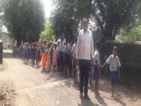 Sweets distributed to school childrens on Dasara